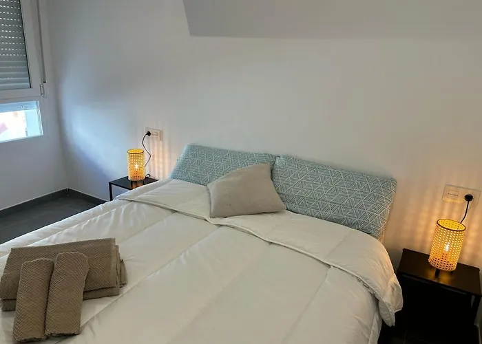 Apartamento premium a pie de playa, con 3 piscinas, mini golf y terraza